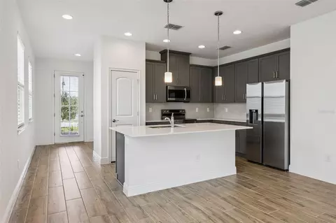 Kitchen - 3200 Oxbow Ct, Harmony, FL 34773 photo 3 of 5