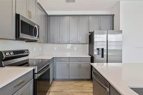 Kitchen - 3200 Oxbow Ct, Harmony, FL 34773 photo 5 of 5