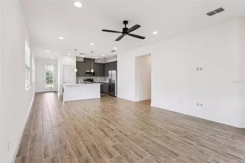 Living - 3200 Oxbow Ct, Harmony, FL 34773 photo 5 of 6