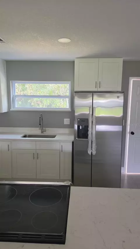 Kitchen - 504 S Moore St, Bunnell, FL 32110 photo 5 of 5