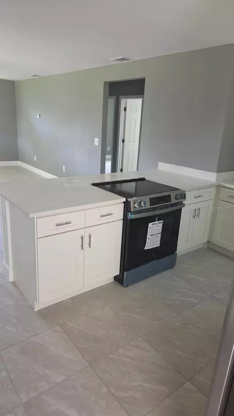Kitchen - 504 S Moore St, Bunnell, FL 32110 photo 3 of 5