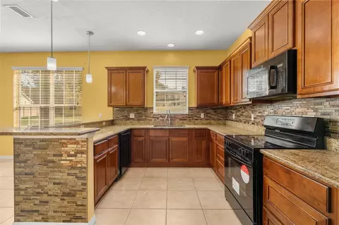 Kitchen - 413 Split Oak Ct, Eustis, FL 32736 photo 3 of 4