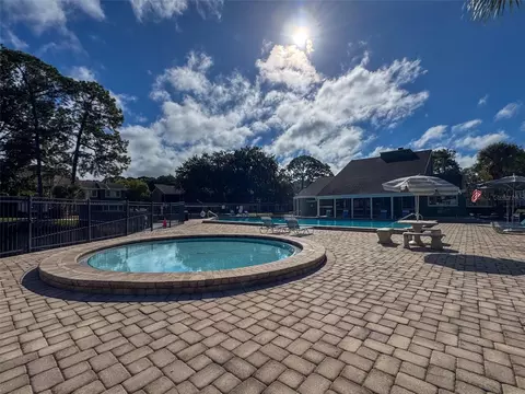 Exterior - 5885 Windhover Dr #4E, Orlando, FL 32819 photo 10 of 11