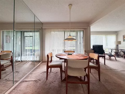 Dining - 5885 Windhover Dr #4E, Orlando, FL 32819 photo 1 of 2