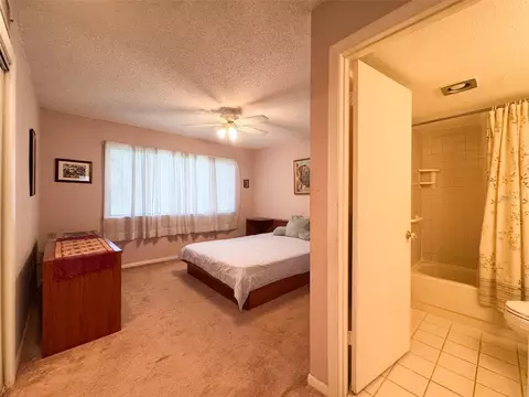 Bedroom - 5885 Windhover Dr #4E, Orlando, FL 32819 photo 4 of 6