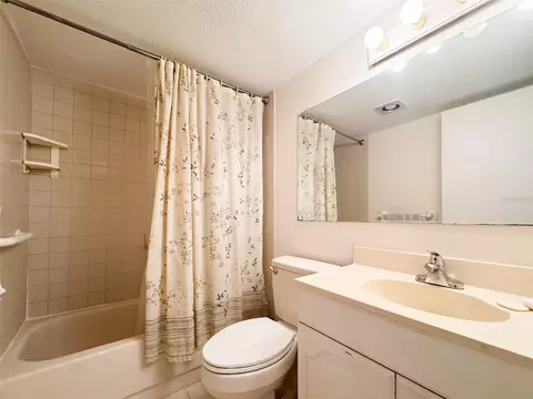 Bath - 5885 Windhover Dr #4E, Orlando, FL 32819 photo 2 of 2
