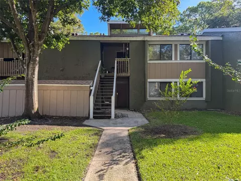 Exterior - 5885 Windhover Dr #4E, Orlando, FL 32819 photo 1 of 11