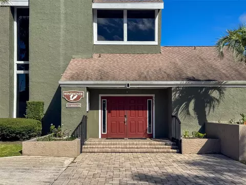 Exterior - 5885 Windhover Dr #4E, Orlando, FL 32819 photo 8 of 11