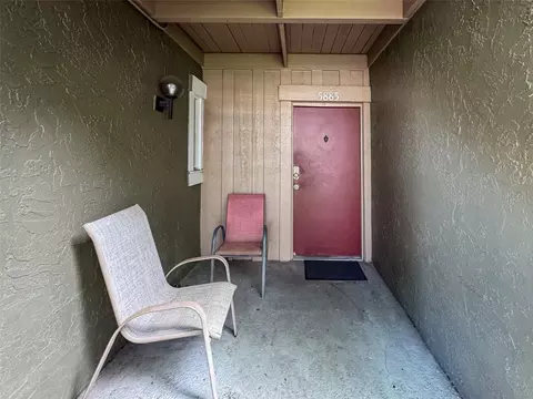 Exterior - 5885 Windhover Dr #4E, Orlando, FL 32819 photo 3 of 11
