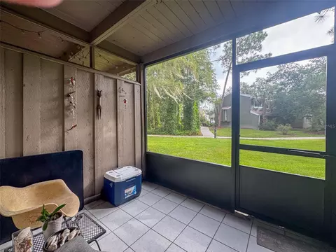 Exterior - 5885 Windhover Dr #4E, Orlando, FL 32819 photo 5 of 11