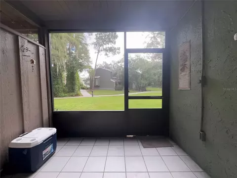 Exterior - 5885 Windhover Dr #4E, Orlando, FL 32819 photo 6 of 11