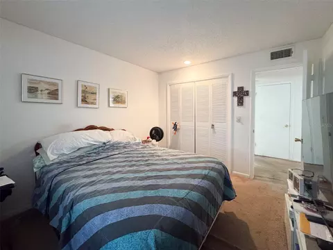 Bedroom - 5885 Windhover Dr #4E, Orlando, FL 32819 photo 2 of 6