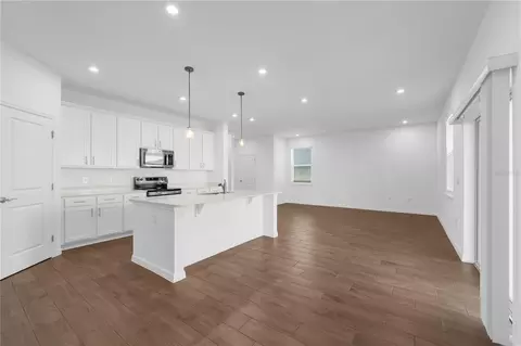 Living - 1678 Meadowgrove Ave NE, Saint Cloud, FL 34771 photo 5 of 5