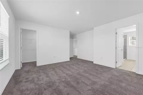 Bedroom - 1678 Meadowgrove Ave NE, Saint Cloud, FL 34771 photo 3 of 9