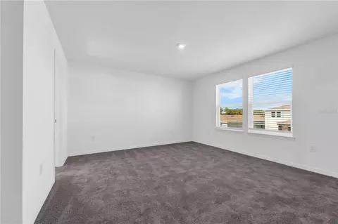 Bedroom - 1678 Meadowgrove Ave NE, Saint Cloud, FL 34771 photo 1 of 9