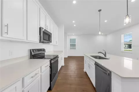 Kitchen - 1678 Meadowgrove Ave NE, Saint Cloud, FL 34771 photo 3 of 5