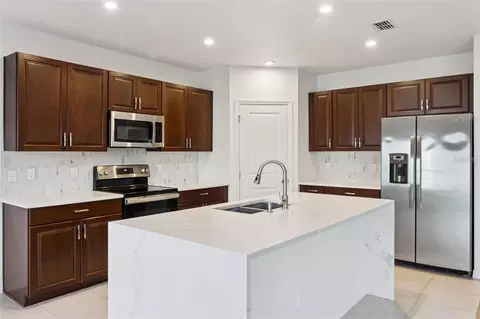 Kitchen - 4108 Deermoss Dr, Clermont, FL 34714 photo 2 of 3