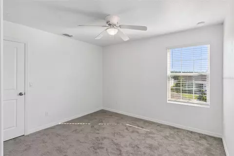 Bedroom - 4108 Deermoss Dr, Clermont, FL 34714 photo 6 of 11