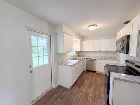 Kitchen - 411 W Seminole Ave, Eustis, FL 32726 photo 1 of 2