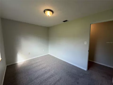 Bedroom - 411 W Seminole Ave, Eustis, FL 32726 photo 2 of 7