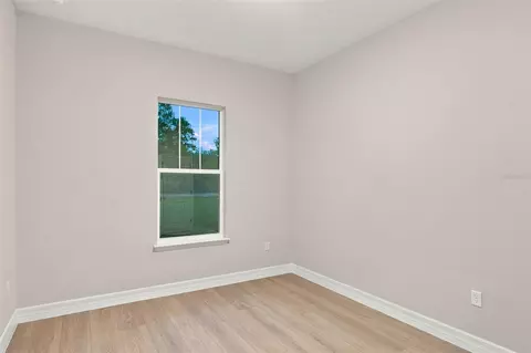Bedroom - 42435 Royal Trails Rd, Eustis, FL 32726 photo 4 of 7