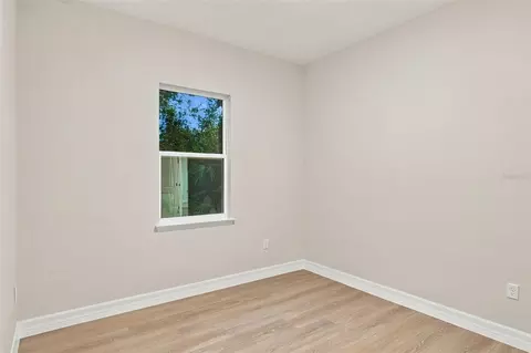 Bedroom - 42435 Royal Trails Rd, Eustis, FL 32726 photo 5 of 7
