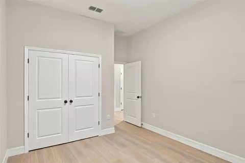 Bedroom - 42435 Royal Trails Rd, Eustis, FL 32726 photo 6 of 7
