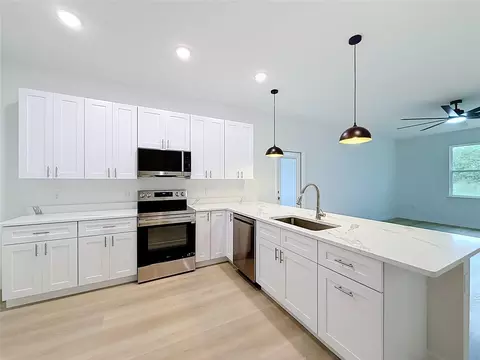 Kitchen - 106 Fruitwood Ave, Eustis, FL 32726 photo 3 of 5
