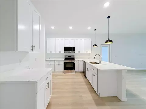 Kitchen - 106 Fruitwood Ave, Eustis, FL 32726 photo 4 of 5