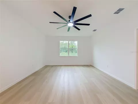 Living - 106 Fruitwood Ave, Eustis, FL 32726 photo 5 of 9