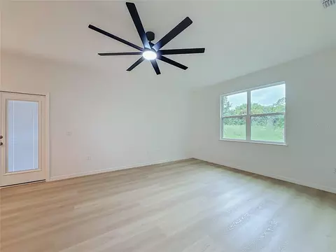 Living - 106 Fruitwood Ave, Eustis, FL 32726 photo 7 of 9