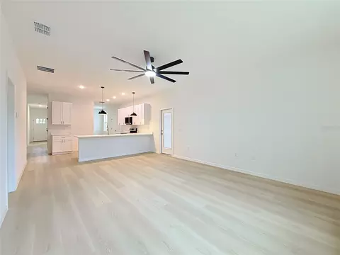 Living - 106 Fruitwood Ave, Eustis, FL 32726 photo 8 of 9