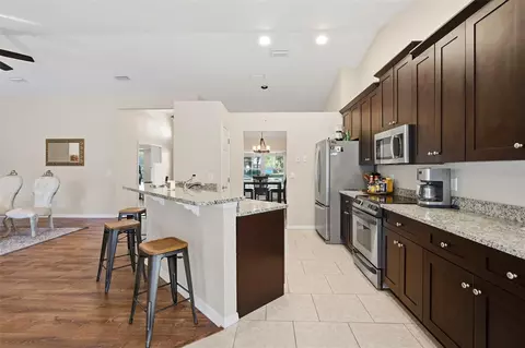 Kitchen - 7709 Apple Tree Cir, Orlando, FL 32819 photo 2 of 2