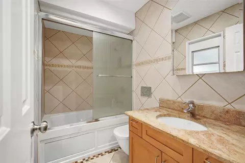 Bath - 7709 Apple Tree Cir, Orlando, FL 32819 photo 4 of 5