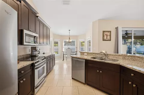 Kitchen - 7709 Apple Tree Cir, Orlando, FL 32819 photo 1 of 2