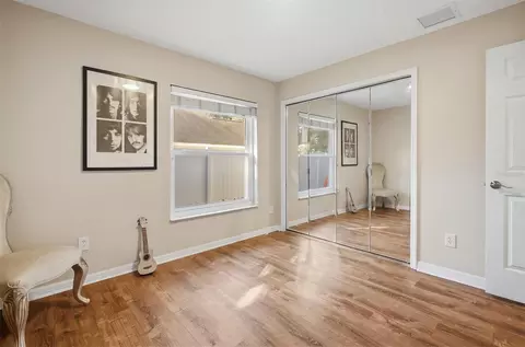 Bedroom - 7709 Apple Tree Cir, Orlando, FL 32819 photo 2 of 3