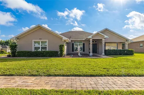 Exterior - 702 Country Walk Cv, Eagle Lake, FL 33839 photo 2 of 7