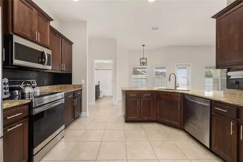 Kitchen - 702 Country Walk Cv, Eagle Lake, FL 33839 photo 2 of 4