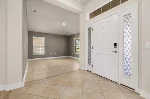 Entry Way - 702 Country Walk Cv, Eagle Lake, FL 33839 photo 3 of 7