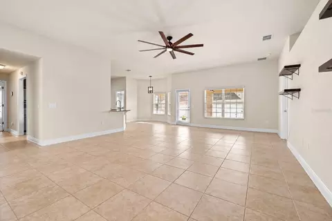 Living - 702 Country Walk Cv, Eagle Lake, FL 33839 photo 4 of 7