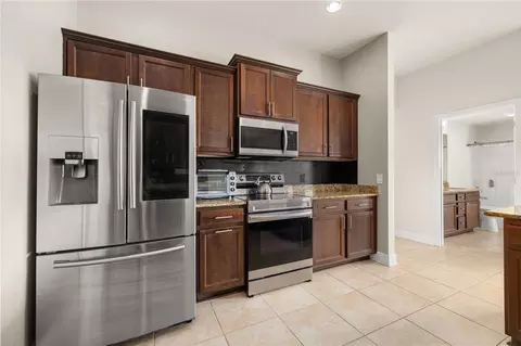 Kitchen - 702 Country Walk Cv, Eagle Lake, FL 33839 photo 3 of 4