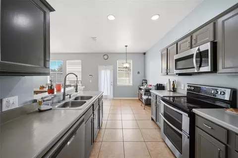 Kitchen - 7142 Five Oaks Dr, Harmony, FL 34773 photo 2 of 3