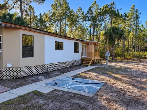 Exterior - 8961 Freedom Rd, Mims, FL 32754 photo 5 of 12