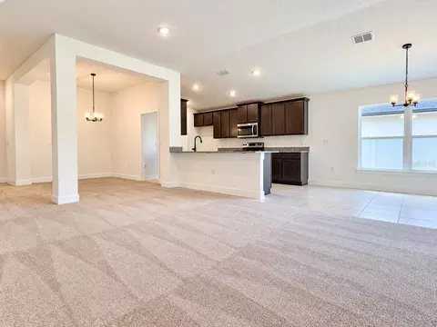 Living - 7696 Bent Tree Loop, Harmony, FL 34773 photo 2 of 2