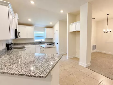 Kitchen - 7702 Bent Tree Loop, Saint Cloud, FL 34773 photo 2 of 2