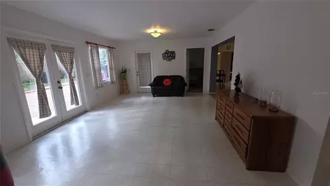 Living - 7514 Herricks Loop, Orlando, FL 32835 photo 3 of 3