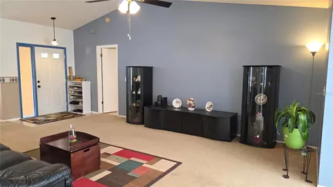 Living - 7514 Herricks Loop, Orlando, FL 32835 photo 1 of 3