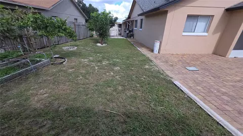Exterior - 7514 Herricks Loop, Orlando, FL 32835 photo 4 of 7