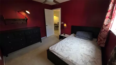 Bedroom - 7514 Herricks Loop, Orlando, FL 32835 photo 3 of 5