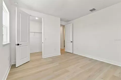 Bedroom - 5650 N Nectarine Dr, Windermere, FL 34786 photo 10 of 12